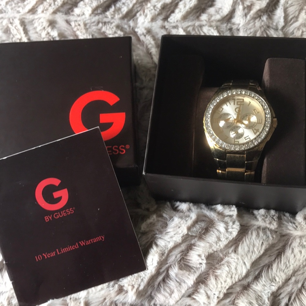 Authentic Guess watch. Box, receipts & warranty.